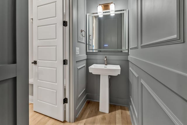 bathroom featuring wood finished floors