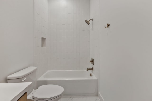 bathroom with vanity, toilet, and shower / washtub combination