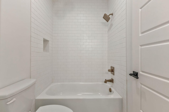 bathroom with toilet and  shower combination