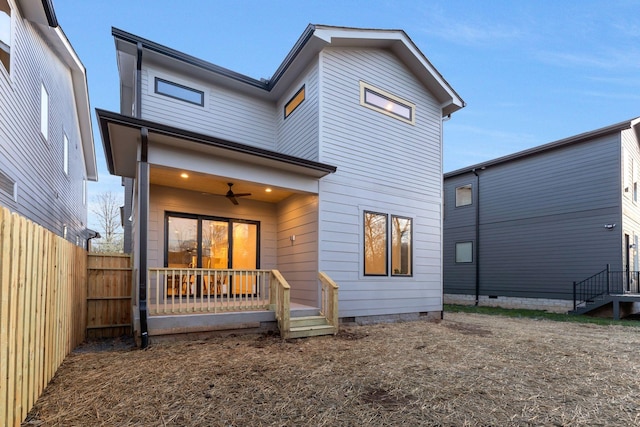 back of house featuring a ceiling fan, fence, and crawl space