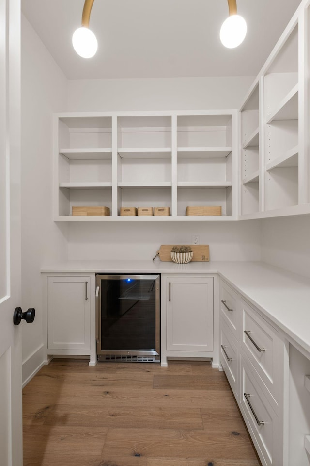 pantry featuring wine cooler