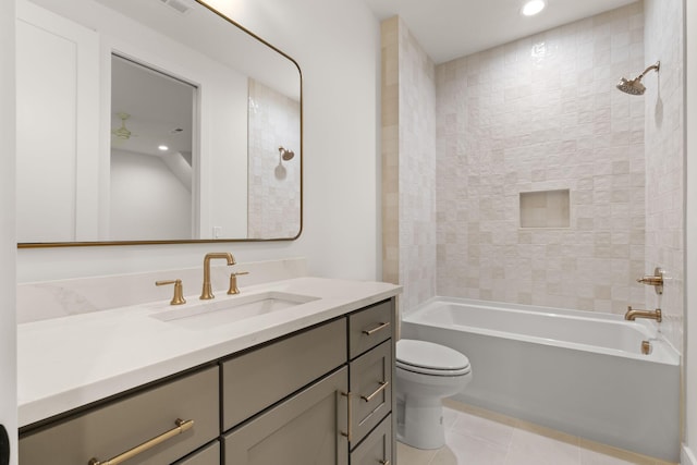 full bathroom featuring recessed lighting, toilet, tile patterned floors, vanity, and shower / washtub combination
