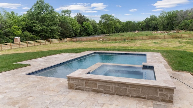 view of pool featuring an in ground hot tub, a fenced in pool, a fenced backyard, a yard, and a patio area