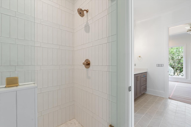 1408 Adams St, Franklin, TN 37064 - bathroom with a tile shower, vanity, tile patterned floors, and baseboards
