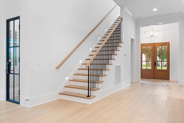 1408 Adams St, Franklin, TN 37064 - foyer with stairway, wood finished floors, french doors, recessed lighting, and crown molding