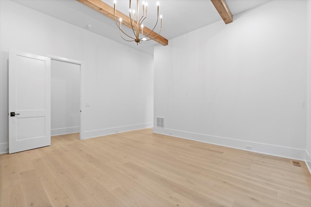 1408 Adams St, Franklin, TN 37064 - spare room with light wood finished floors, a chandelier, and baseboards