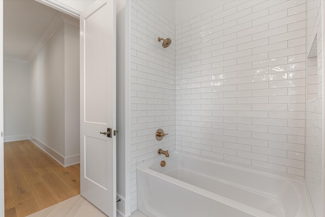 1408 Adams St, Franklin, TN 37064 - bathroom with wood finished floors, crown molding, shower / bathtub combination, and baseboards