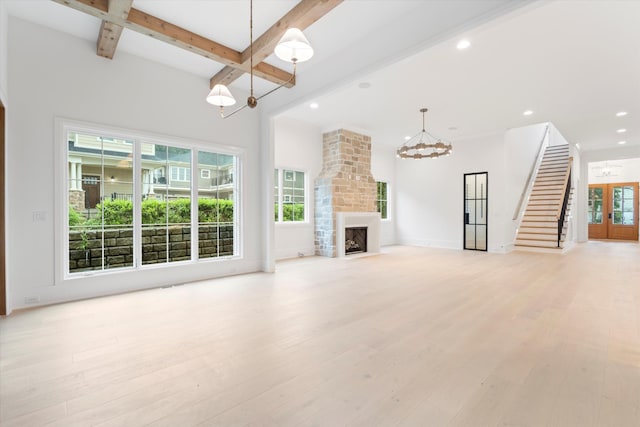 1408 Adams St, Franklin, TN 37064 - unfurnished living room with a chandelier, healthy amount of natural light, beam ceiling, recessed lighting, and light wood finished floors