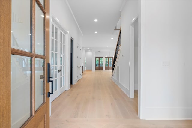 1408 Adams St, Franklin, TN 37064 - hall with stairs, light wood-type flooring, baseboards, french doors, and recessed lighting