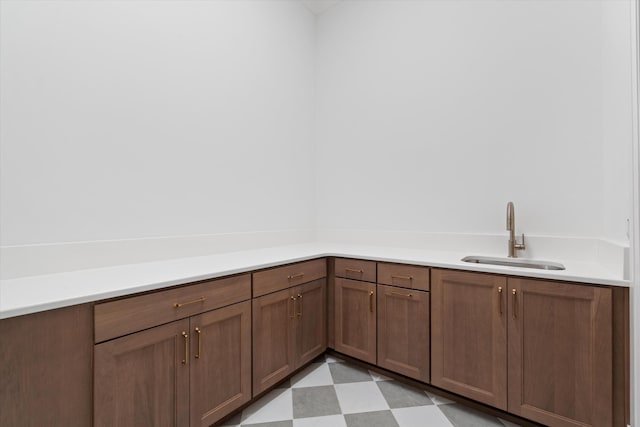 1408 Adams St, Franklin, TN 37064 - kitchen featuring a sink, light countertops, and light flooring