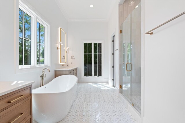 1408 Adams St, Franklin, TN 37064 - full bath with a shower stall, vanity, a freestanding tub, tile patterned floors, and crown molding