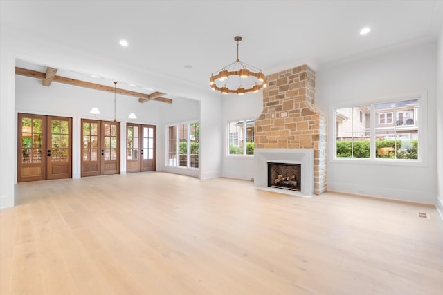 1408 Adams St, Franklin, TN 37064 - unfurnished living room with beam ceiling, a chandelier, wood finished floors, recessed lighting, and a large fireplace