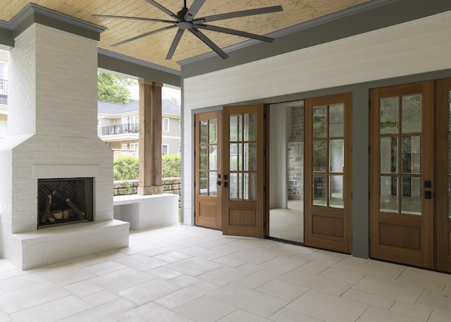 1408 Adams St, Franklin, TN 37064 - entryway with ceiling fan, crown molding, tile patterned flooring, an outdoor brick fireplace, and wood ceiling