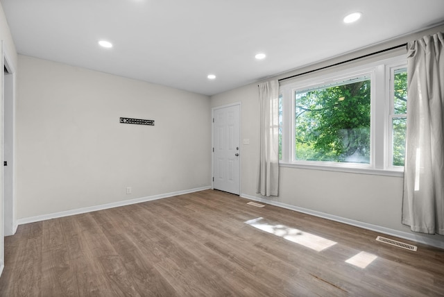1872 River Rd, Clarksville, TN 37040 - spare room with baseboards, wood finished floors, and recessed lighting