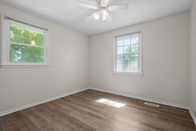 1872 River Rd, Clarksville, TN 37040 - spare room with healthy amount of natural light, wood finished floors, and baseboards
