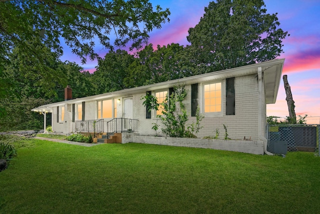 1872 River Rd, Clarksville, TN 37040 - ranch-style house with brick siding and a chimney