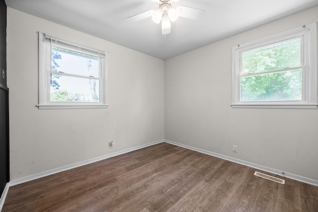 1872 River Rd, Clarksville, TN 37040 - spare room featuring wood finished floors, baseboards, and ceiling fan