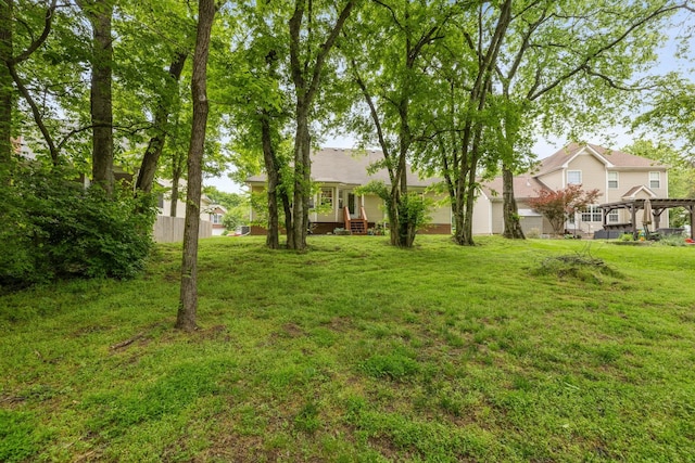 view of yard with fence