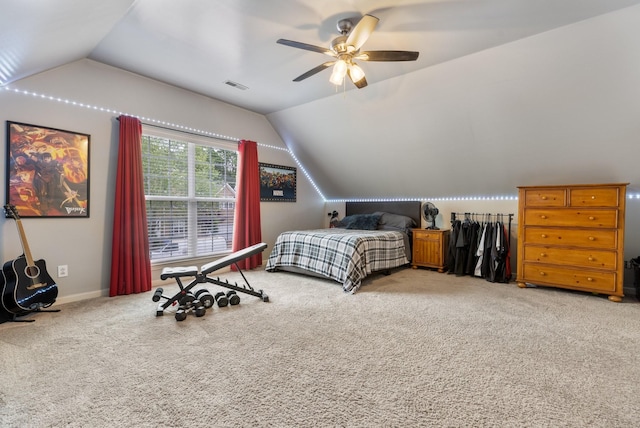 bedroom with ceiling fan, lofted ceiling, carpet floors, and baseboards