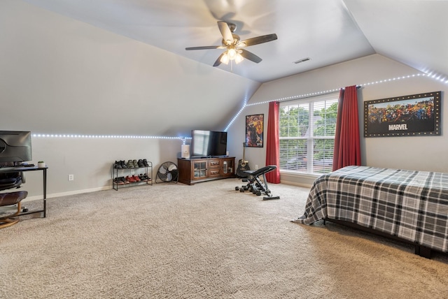 bedroom featuring vaulted ceiling, carpet, and visible vents
