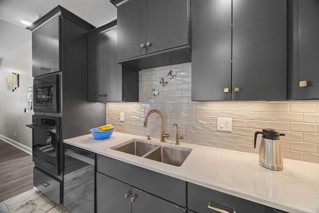 601 Joyce Ave, Lewisburg, TN 37091 - kitchen featuring black oven, light countertops, built in microwave, and a sink