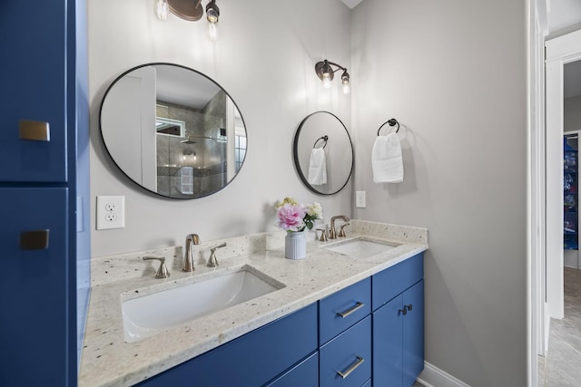 601 Joyce Ave, Lewisburg, TN 37091 - full bathroom with double vanity, baseboards, a tile shower, and a sink