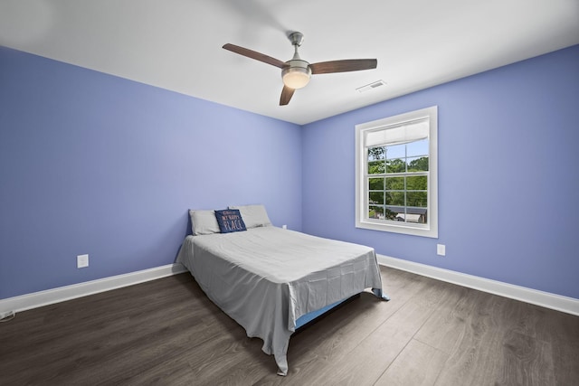 601 Joyce Ave, Lewisburg, TN 37091 - bedroom featuring ceiling fan, baseboards, visible vents, and wood finished floors