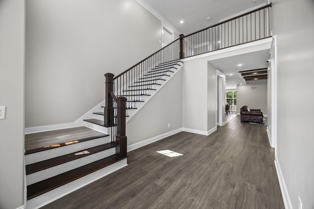 601 Joyce Ave, Lewisburg, TN 37091 - staircase featuring a towering ceiling, baseboards, recessed lighting, and wood finished floors