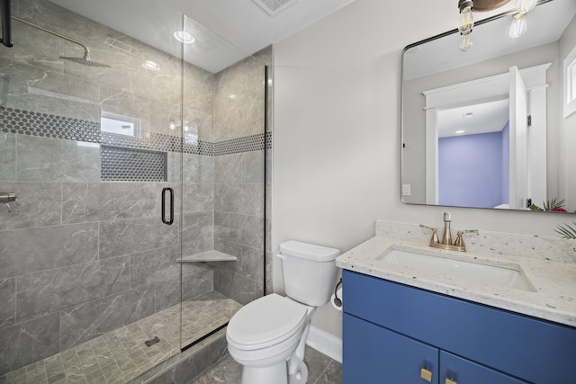 601 Joyce Ave, Lewisburg, TN 37091 - full bath with a stall shower, vanity, toilet, and baseboards