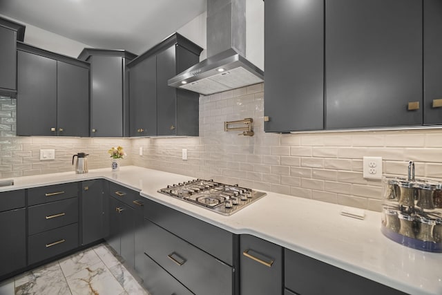 601 Joyce Ave, Lewisburg, TN 37091 - kitchen with stainless steel gas stovetop, light countertops, marble finish floor, and wall chimney exhaust hood