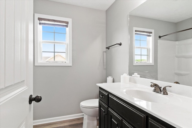 125 Southview Dr, Lewisburg, TN 37091 - bathroom featuring toilet, baseboards, walk in shower, vanity, and wood finished floors