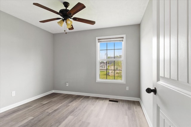 125 Southview Dr, Lewisburg, TN 37091 - unfurnished room with visible vents, wood finished floors, baseboards, and ceiling fan