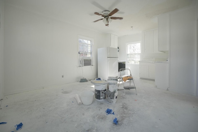 unfurnished living room with cooling unit, concrete flooring, and ceiling fan