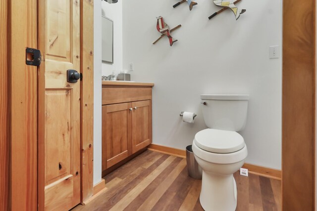 448 Dean Acre Ln, Liberty, TN 37095 - bathroom featuring baseboards, vanity, toilet, and wood finished floors