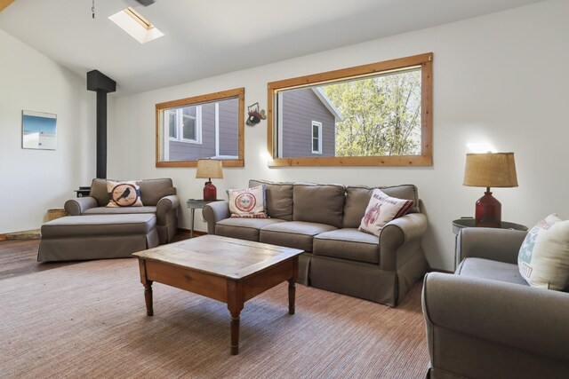 448 Dean Acre Ln, Liberty, TN 37095 - living area with a wood stove and vaulted ceiling with skylight
