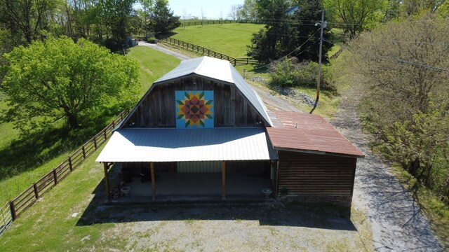 448 Dean Acre Ln, Liberty, TN 37095 - exterior space with fence, a rural view, and a lawn