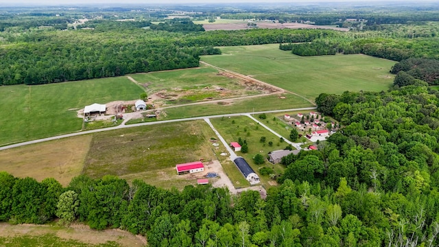 birds eye view of property with a rural view