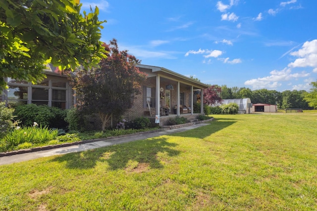 view of yard featuring a porch