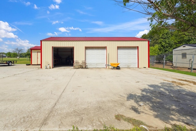 detached garage with fence