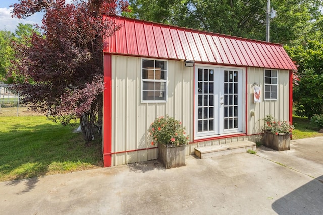 view of outbuilding featuring an outdoor structure and french doors