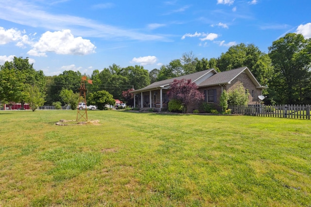 view of yard with fence