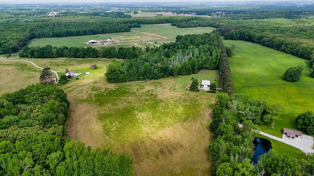 drone / aerial view with a rural view and a water view