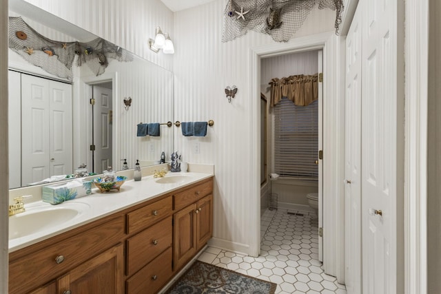 746 Shadow Ln, Belvidere, TN 37306 - full bathroom featuring a closet, toilet, double vanity, and tile patterned floors