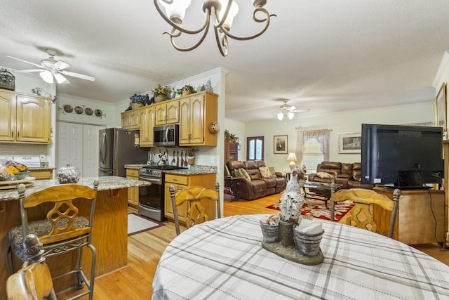 746 Shadow Ln, Belvidere, TN 37306 - dining room with ceiling fan, light wood finished floors, a chandelier, a textured ceiling, and crown molding
