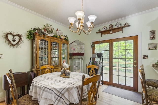 746 Shadow Ln, Belvidere, TN 37306 - dining room featuring a chandelier, crown molding, and light wood-style flooring
