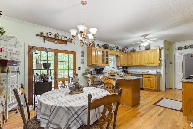 746 Shadow Ln, Belvidere, TN 37306 - dining area featuring ornamental molding, a chandelier, plenty of natural light, light wood-type flooring, and a textured ceiling