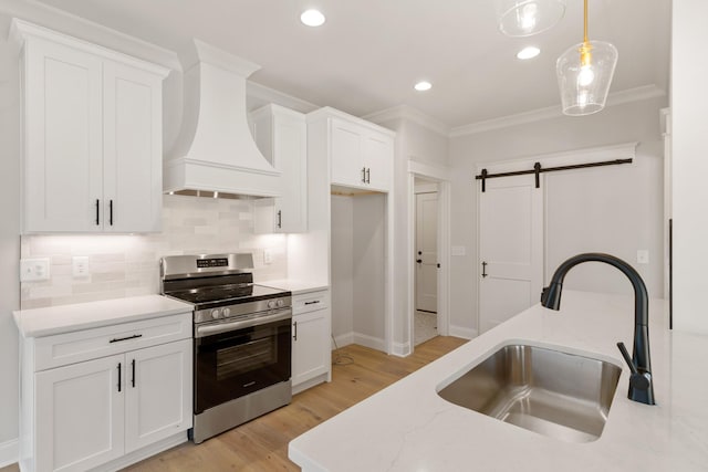 119 Casey St, Brush Creek, TN 38547 - kitchen featuring a sink, crown molding, backsplash, stainless steel electric range oven, and white cabinetry