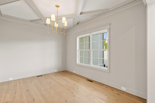 119 Casey St, Brush Creek, TN 38547 - spare room featuring baseboards, light wood finished floors, an inviting chandelier, and coffered ceiling