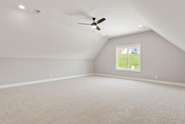 119 Casey St, Brush Creek, TN 38547 - additional living space featuring visible vents, baseboards, lofted ceiling, and light carpet