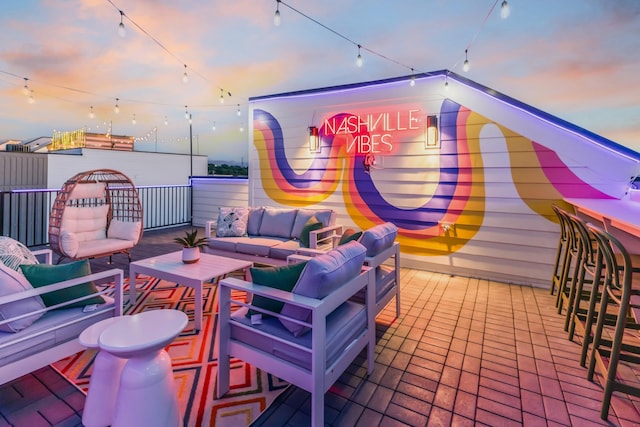 2176 Carson St Unit 5, Nashville, TN 37211 - patio terrace at dusk with outdoor lounge area